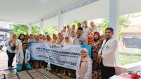 Dosen dan mahasiswa Universitas Binawan melaksanakan kegiatan pengabdian masyarakat di Batu Ampar, Condet, Jakarta Timur